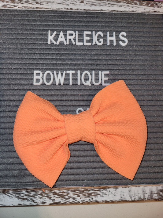 Neon orange bow