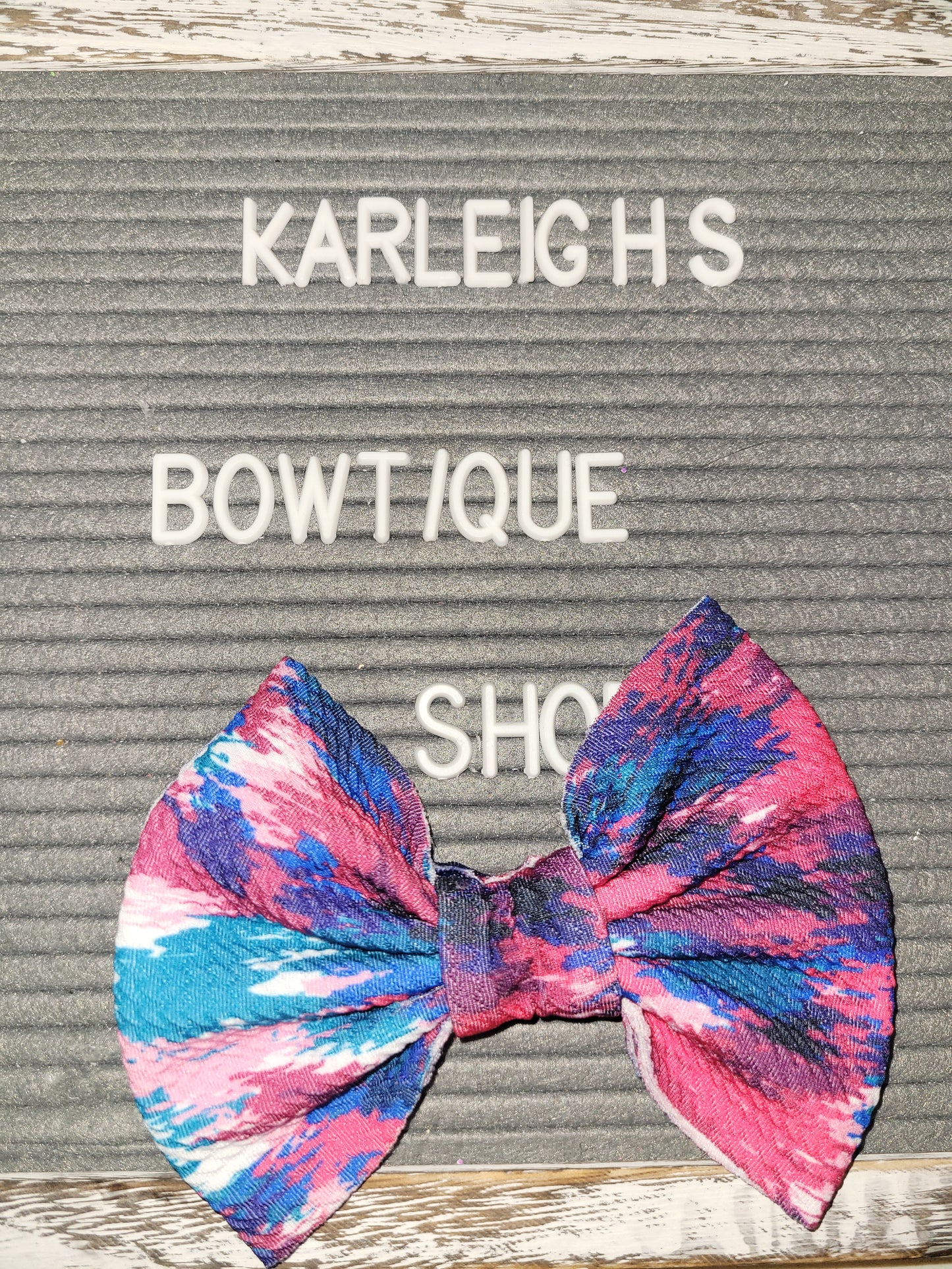 Pink,white and blue tye dye bow