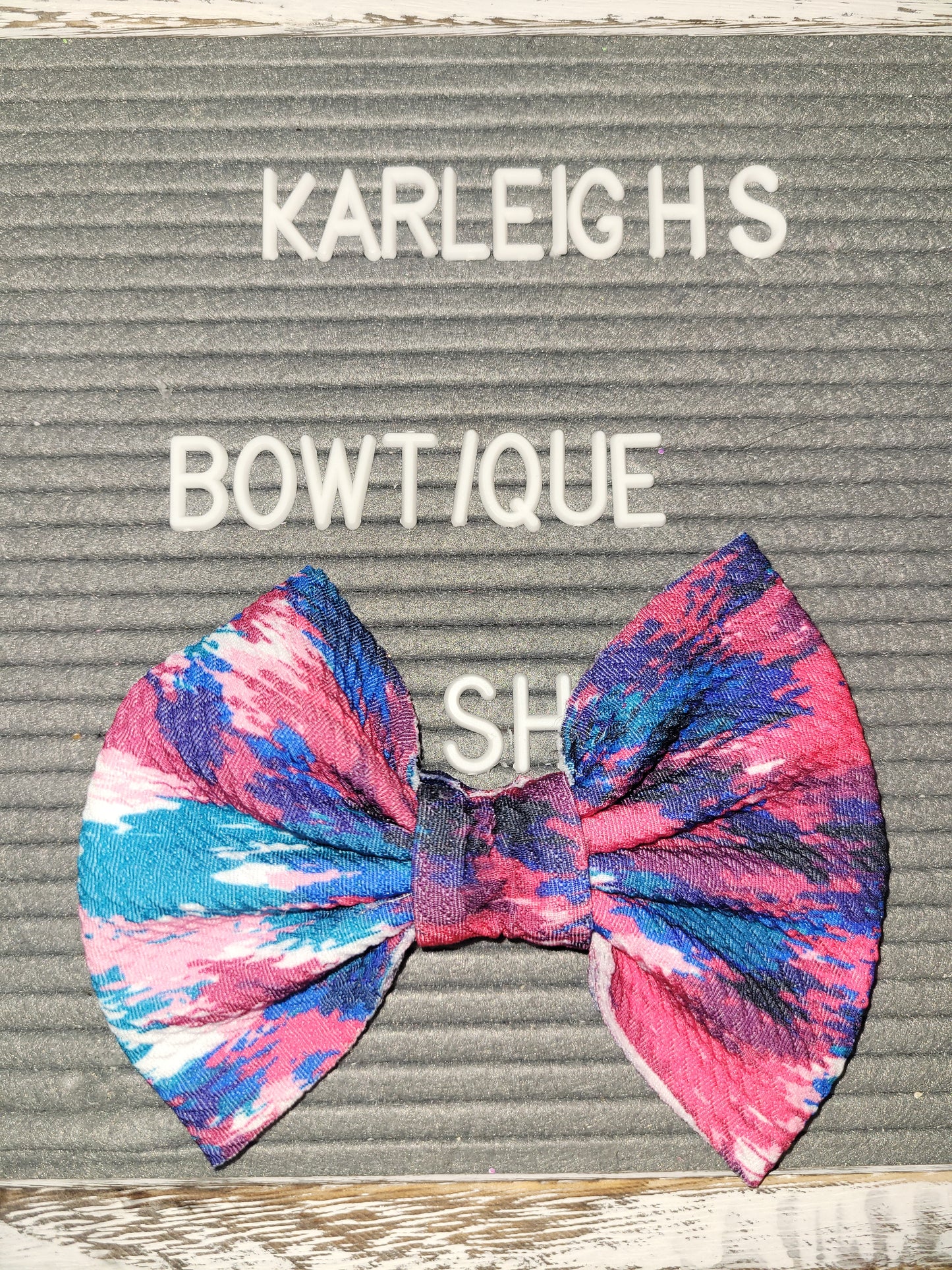 Pink,white and blue tye dye bow