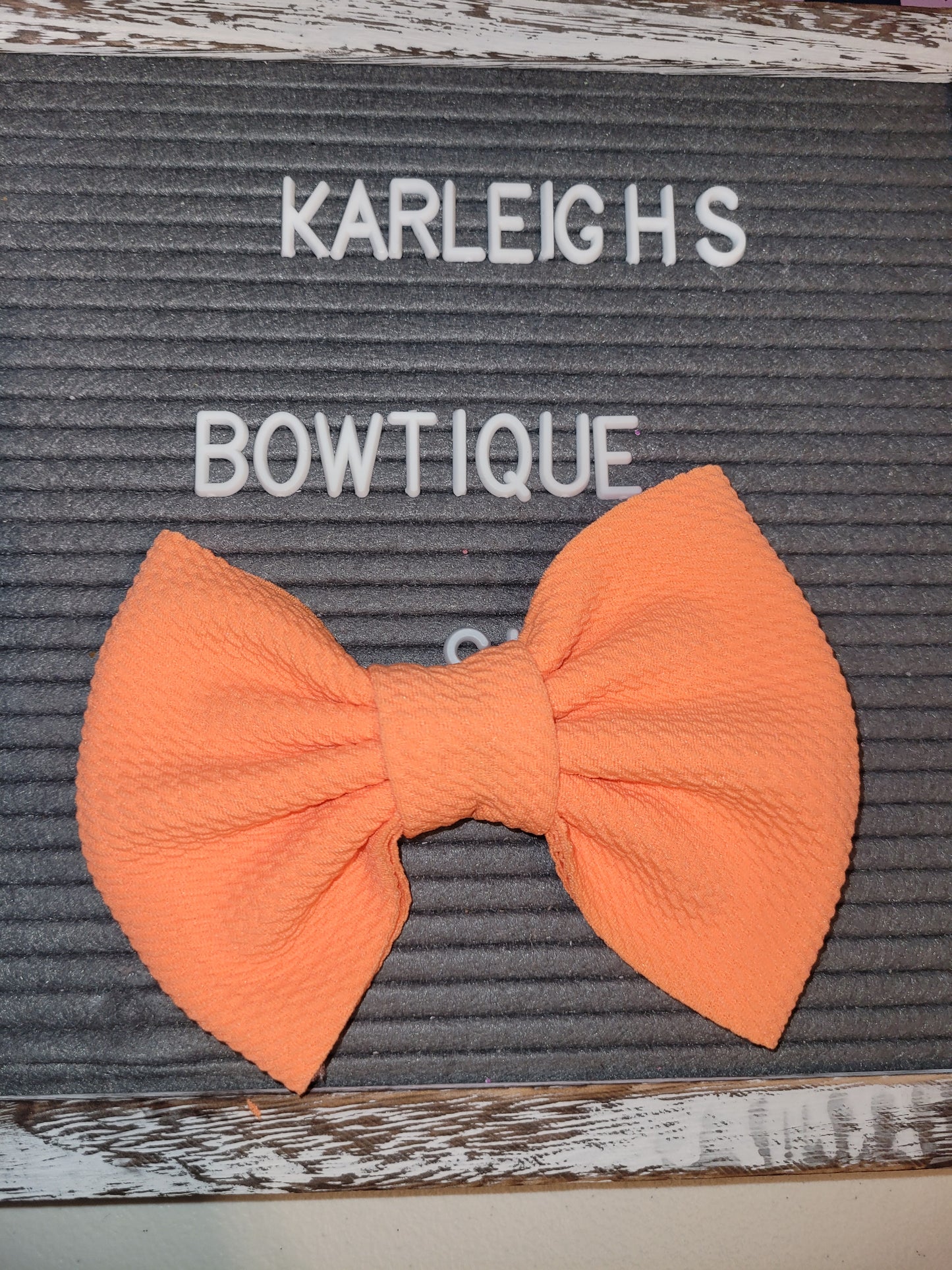 Neon orange bow