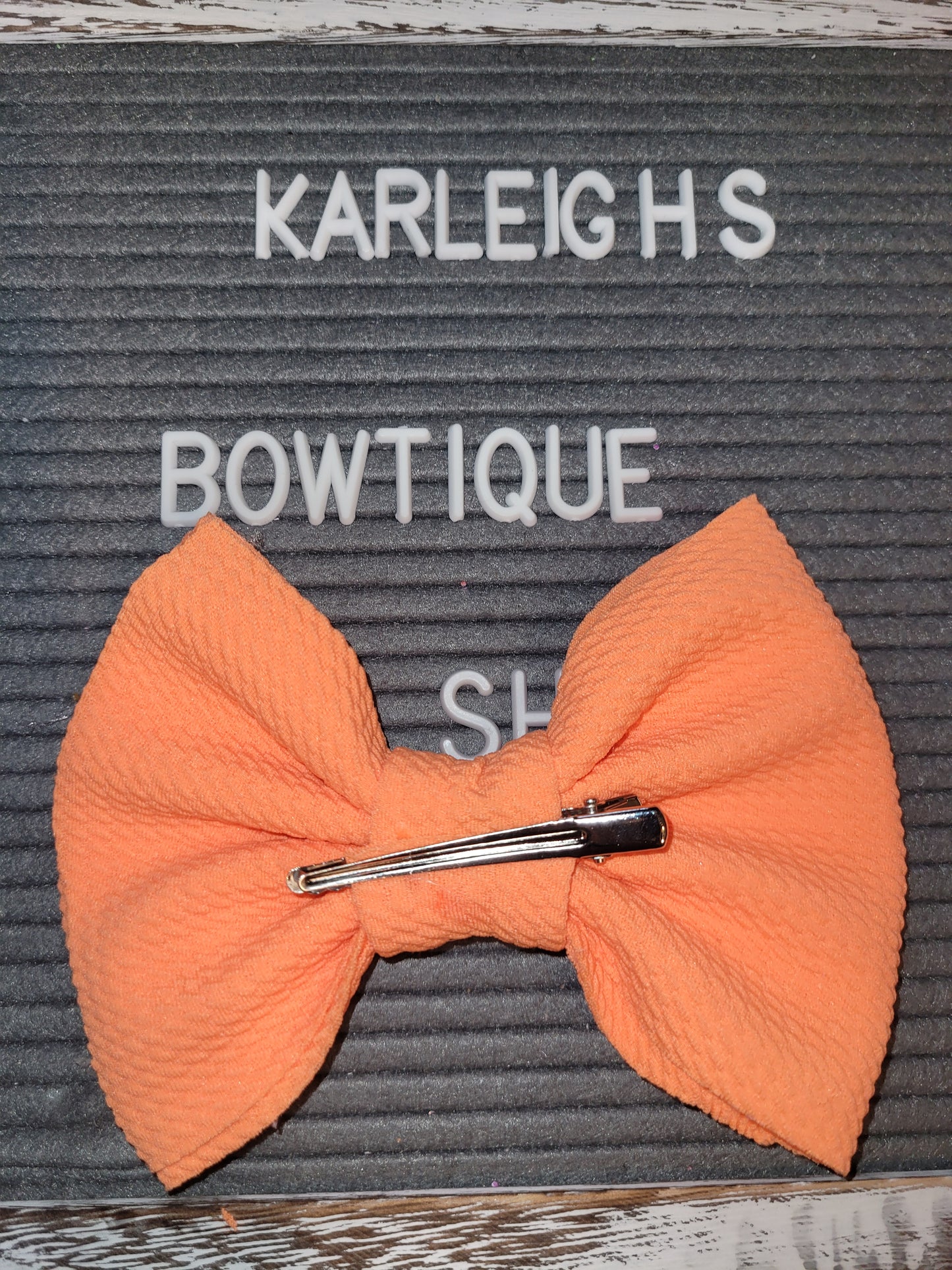 Neon orange bow